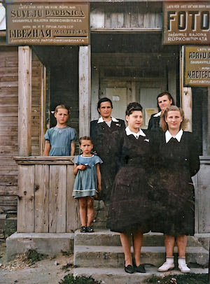 The house of Tanya's uncle Israel Dumesh.  This is where Tanya worked as a seamstress.  Tanya, Julya and Raisa are on the left.  The others are other workers in the shop. 